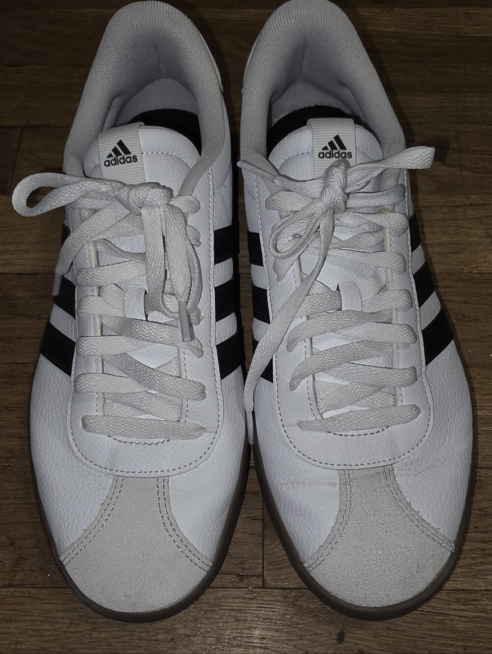 Adidas Men’s White Classic Sneakers with Black Stripes